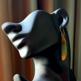 Hand carved large New Zealand Flower jade drop earrings. Made by NZ Pacific from real jade. Online jewellery for sale online by NZ Pacific. Hand carved here in New Zealand.